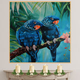Tropical Blue Parrot Pair Artwork Featuring Vibrant Feathers and Orange Beaks Perched on a Branch with Lush Green Foliage and Delicate Pink Flowers on Ready to Hang 1.5" Thick Canvas Wrap, Floating Framed Canvas, Flat Rolled Canvas